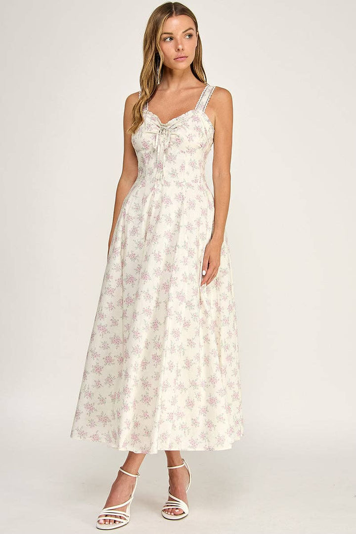 Woman wearing a floral dress on a white background