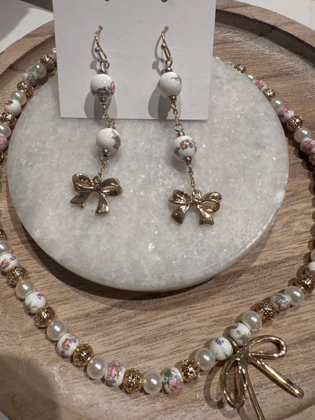 Bow Pearl detail earrings