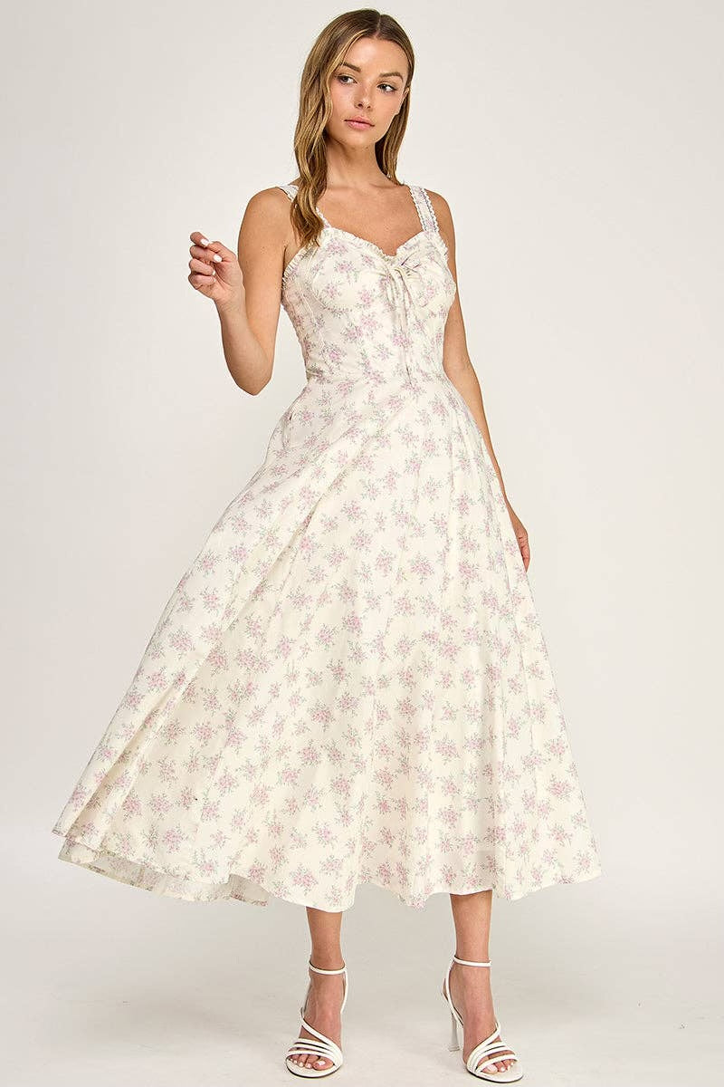 Woman wearing a floral dress on a white background