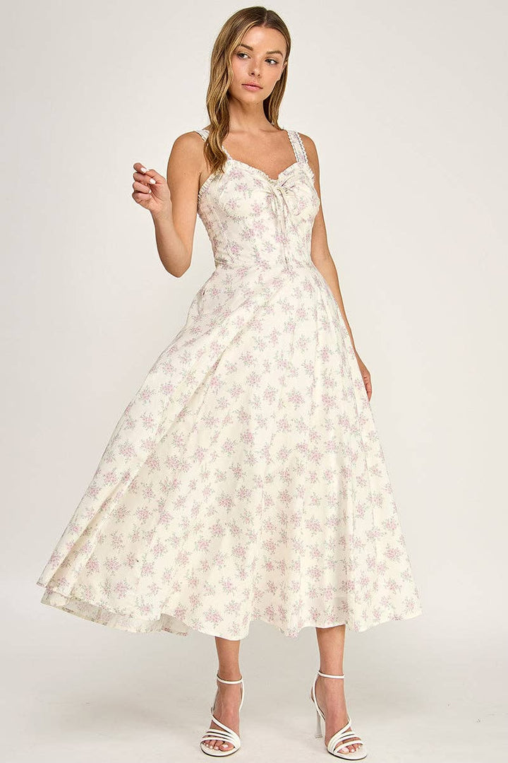 Woman wearing a floral dress on a white background