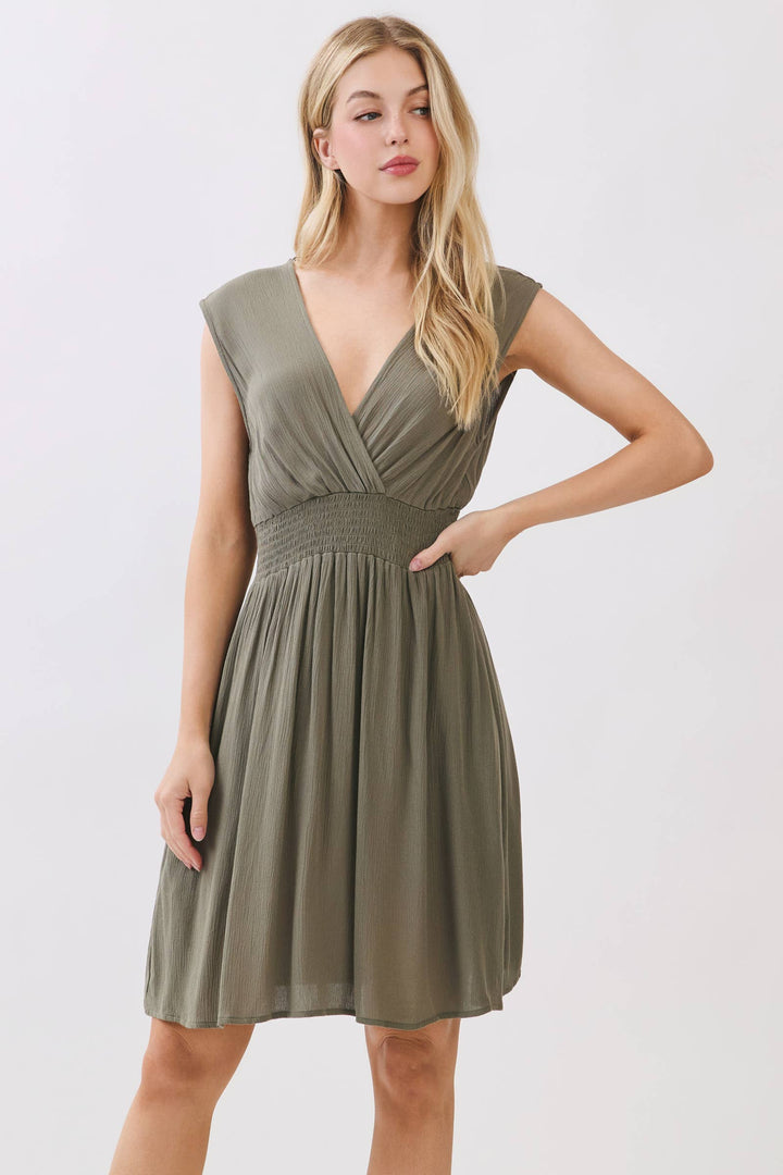 SURPLICE SMOCKED WAIST MINI DRESS - VJD400097
